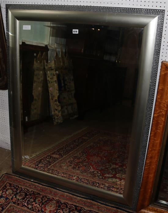 Silver framed bevelled edged mirror(-)